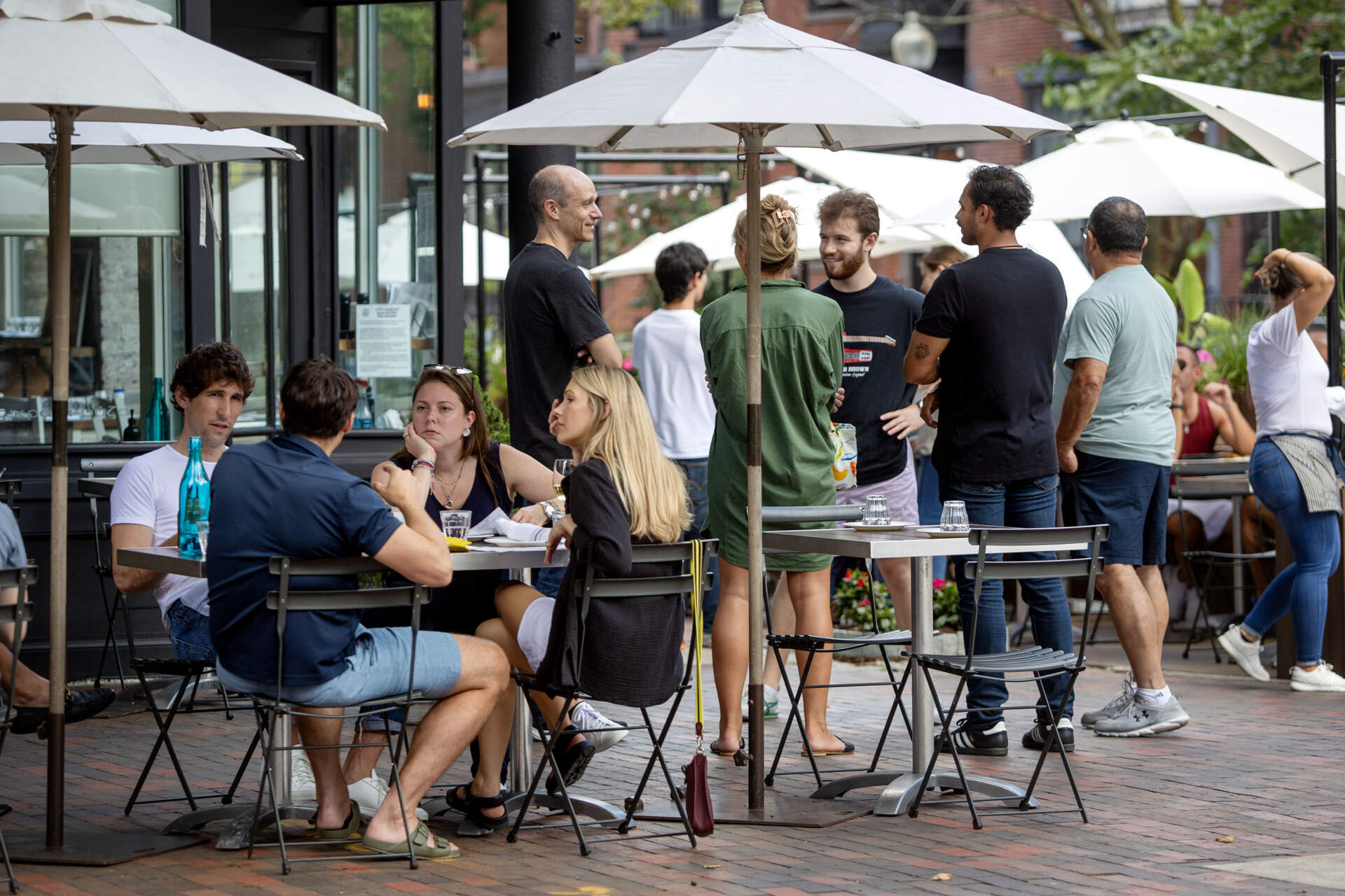 People gather at lunchtime by Kava on Shawmut Avenue in Boston. (Robin Lubbock/WBUR)