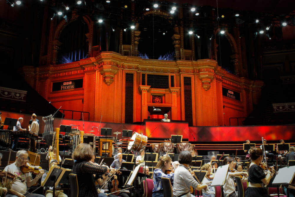 The BSO warming up for its first 2023 concert in London at Royal Albert Hall. (Wilder Fleming/WBUR)
