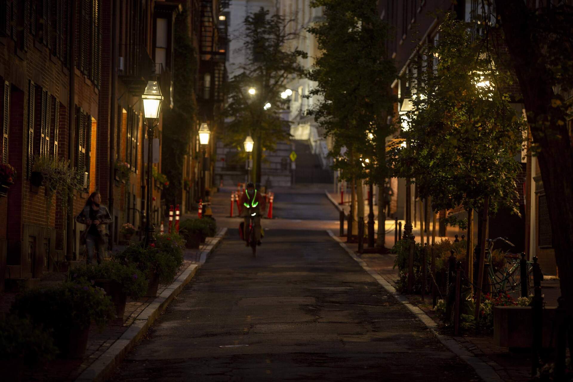 Gas lamps illuminate Temple Street on a fall evening in 2020. (Robin Lubbock/WBUR)