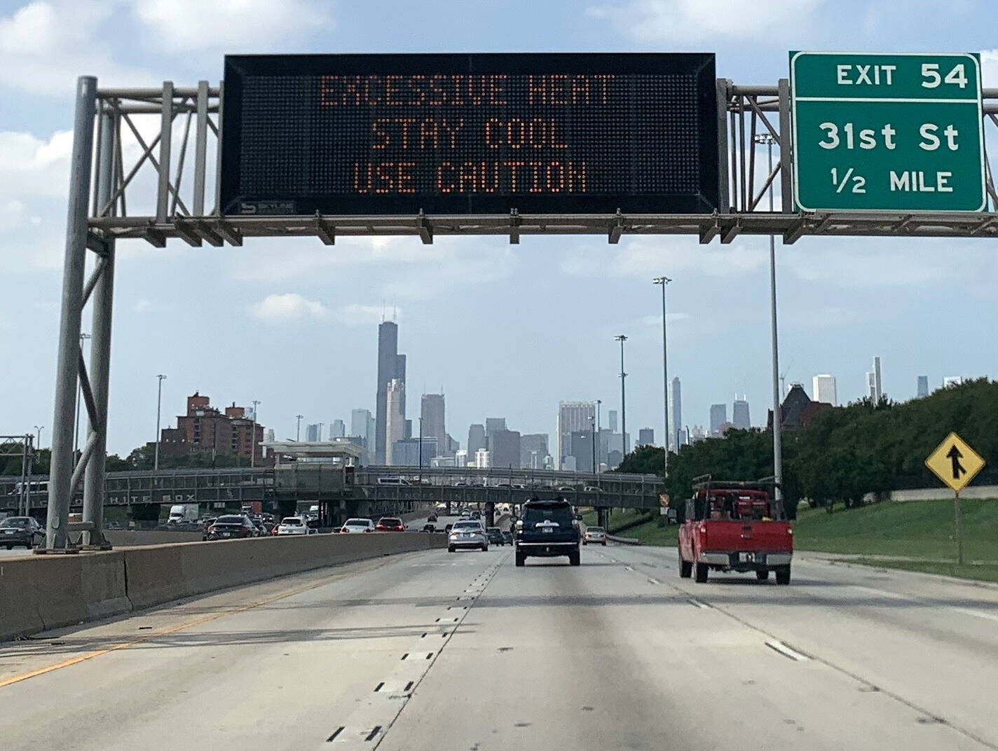 Excessive heat warning displayed on the Dan Ryan Expressway. (Chris Bentley/Here &amp; Now)