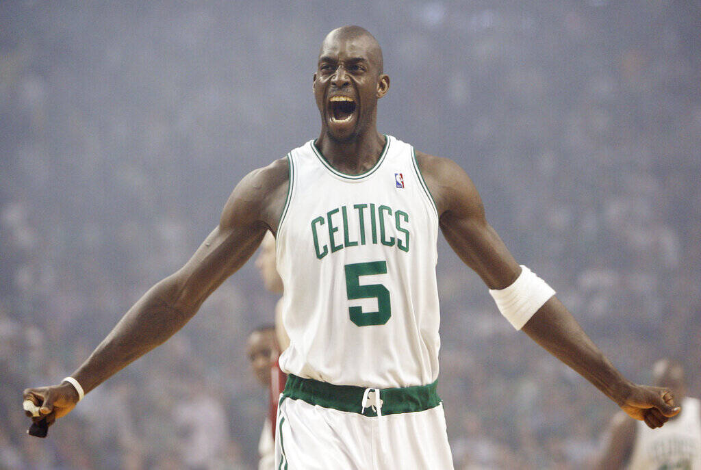 Boston Celtics' Kevin Garnett gestures to the crowd just before tipoff of Game 1 of an NBA Eastern Conference semifinal basketball series against the Cleveland Cavaliers in Boston, Tuesday, May 6, 2008. KG is set to add another chapter to his legacy when he becomes the 24th member of the Celtics organization to have his jersey number retired. (Winslow Townson/AP file)