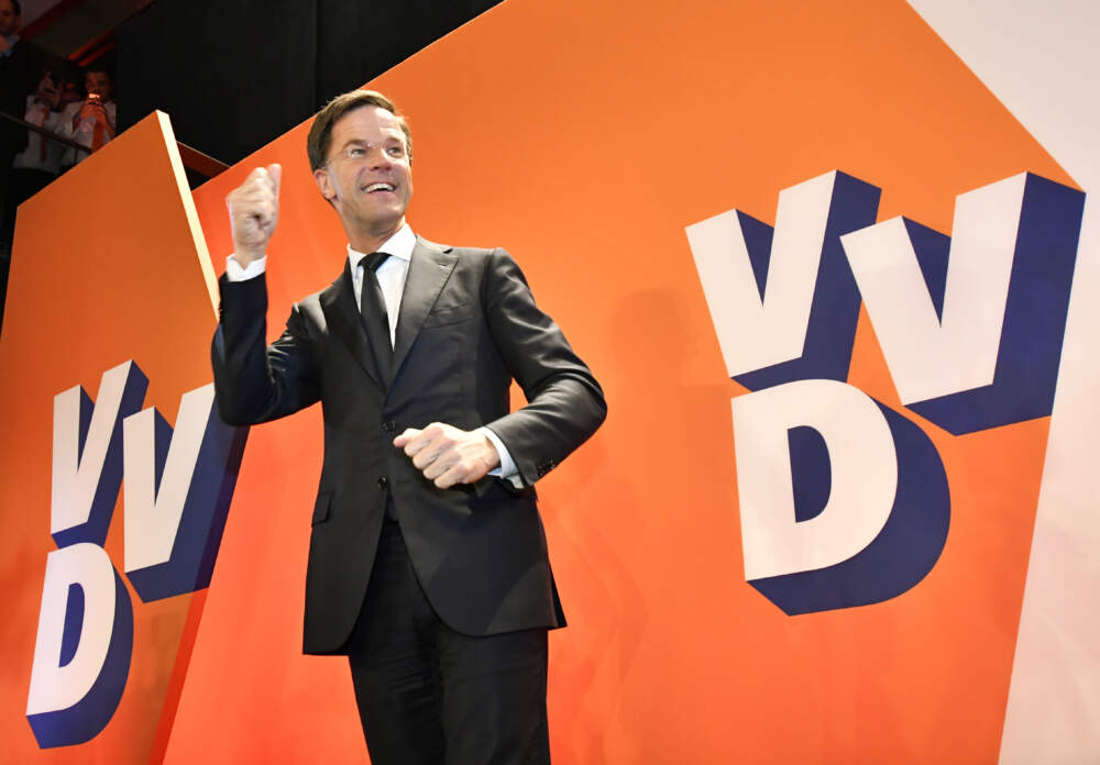 Netherlands' Prime Minister Mark Rutte celebrates after exit poll results of the parliamentary elections were announced. (Patrick Post/AP)