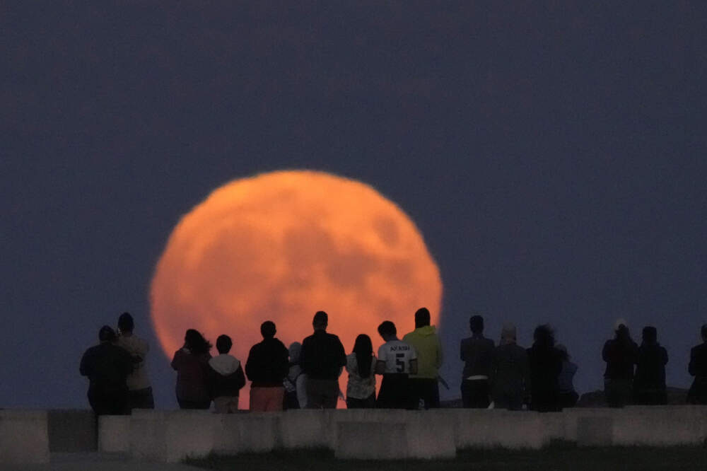 Photos: A rare blue supermoon rises over the world | WBUR News