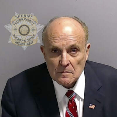 Rudy Giuliani on Aug. 23, in Atlanta, after he surrendered and was booked. (Fulton County Sheriff's Office via AP)