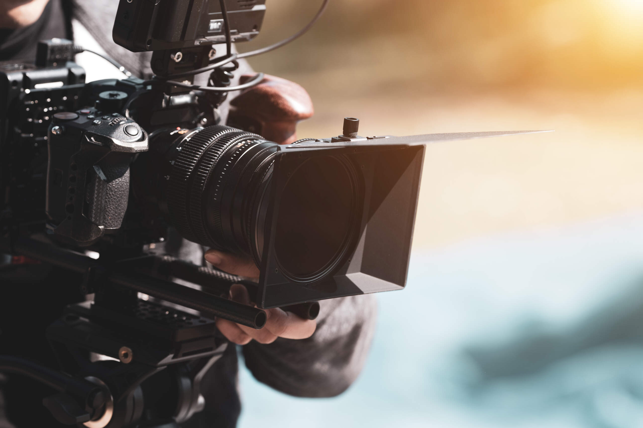 A filmmaker uses a camera. (Getty Images)