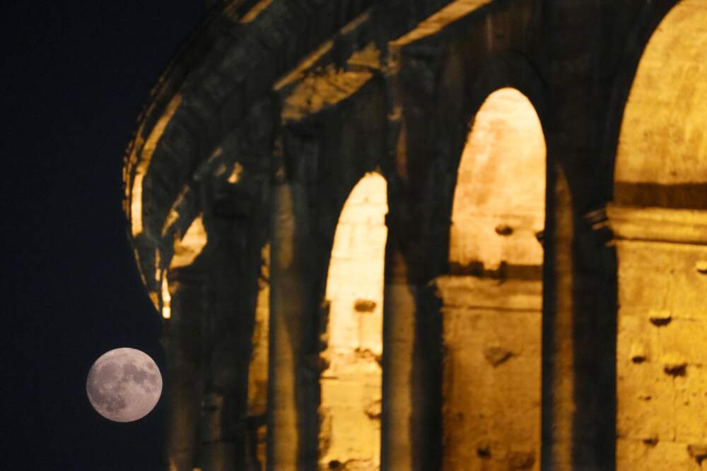 A supermoon rises over the Colosseum in Rome, Wednesday, Aug. 30, 2023. (Gregorio Borgia/AP)