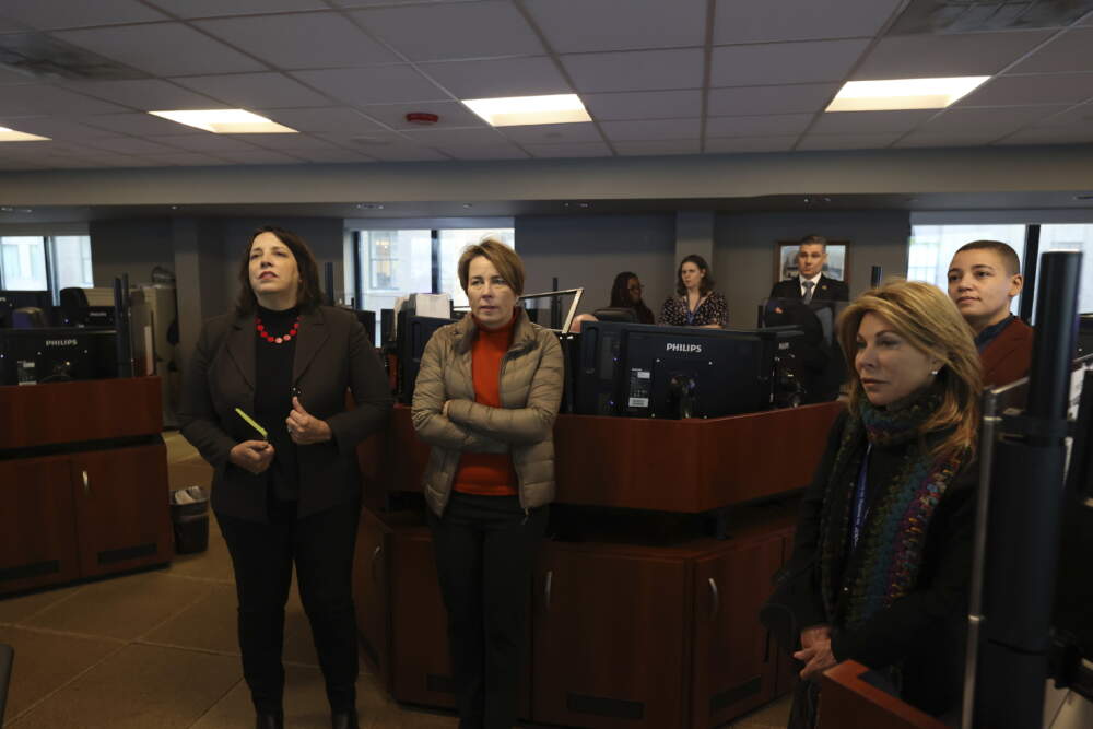 Massachusetts Gov. Maura Healey, second from left, and Lt. Gov. Kim Driscoll, left, Secretary of the Massachusetts Department of Transportation Gina Fiandaca, right, tour a MBTA Operations Control Center, Thursday, Feb. 2, 2023. (Barry Chin/The Boston Globe via AP)