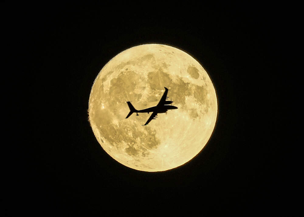 Akıncı unmanned aerial craft passing in front of the Supermoon during a demonstration flight on the first day of Teknofest technology and aerospace festival in Ankara, Turkey, Wednesday, Aug. 30, 2023. (Emrah Gurel/AP)