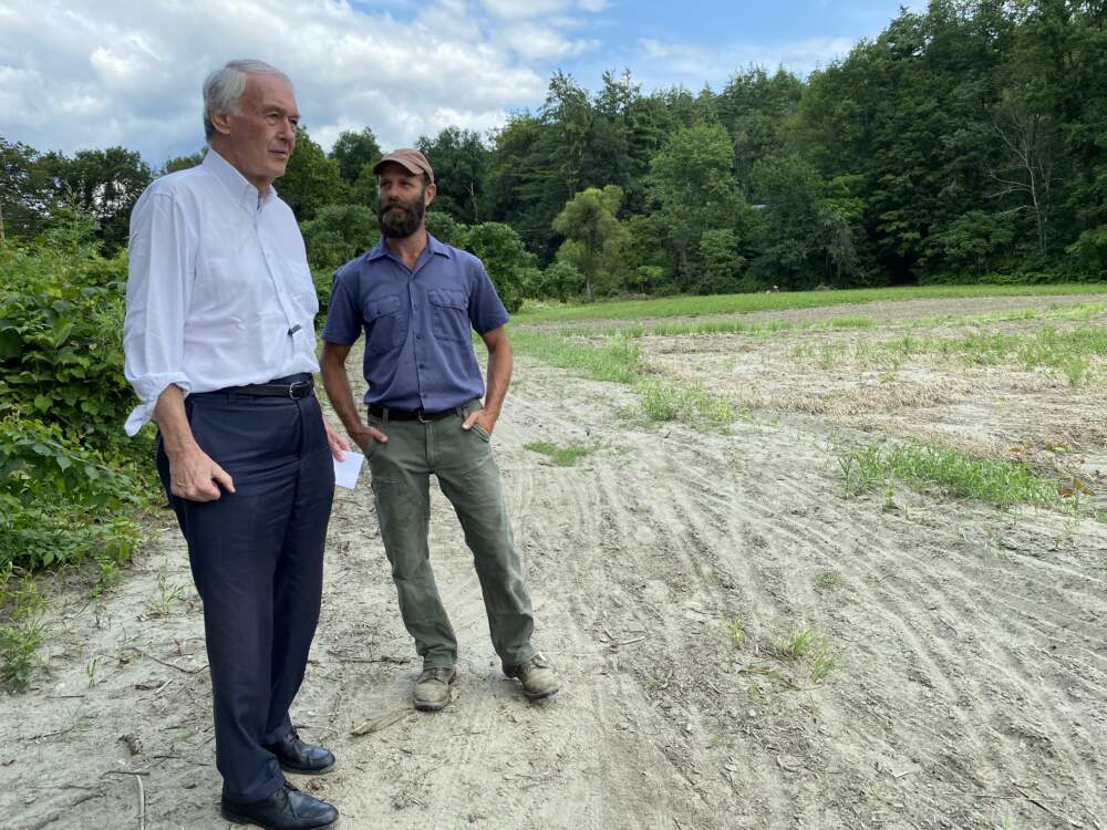 U.S. Senator Ed Markey visits David Fisher on his farm in Conway, Mass., to discuss flood damage. Photo by Barbara Moran, WBUR