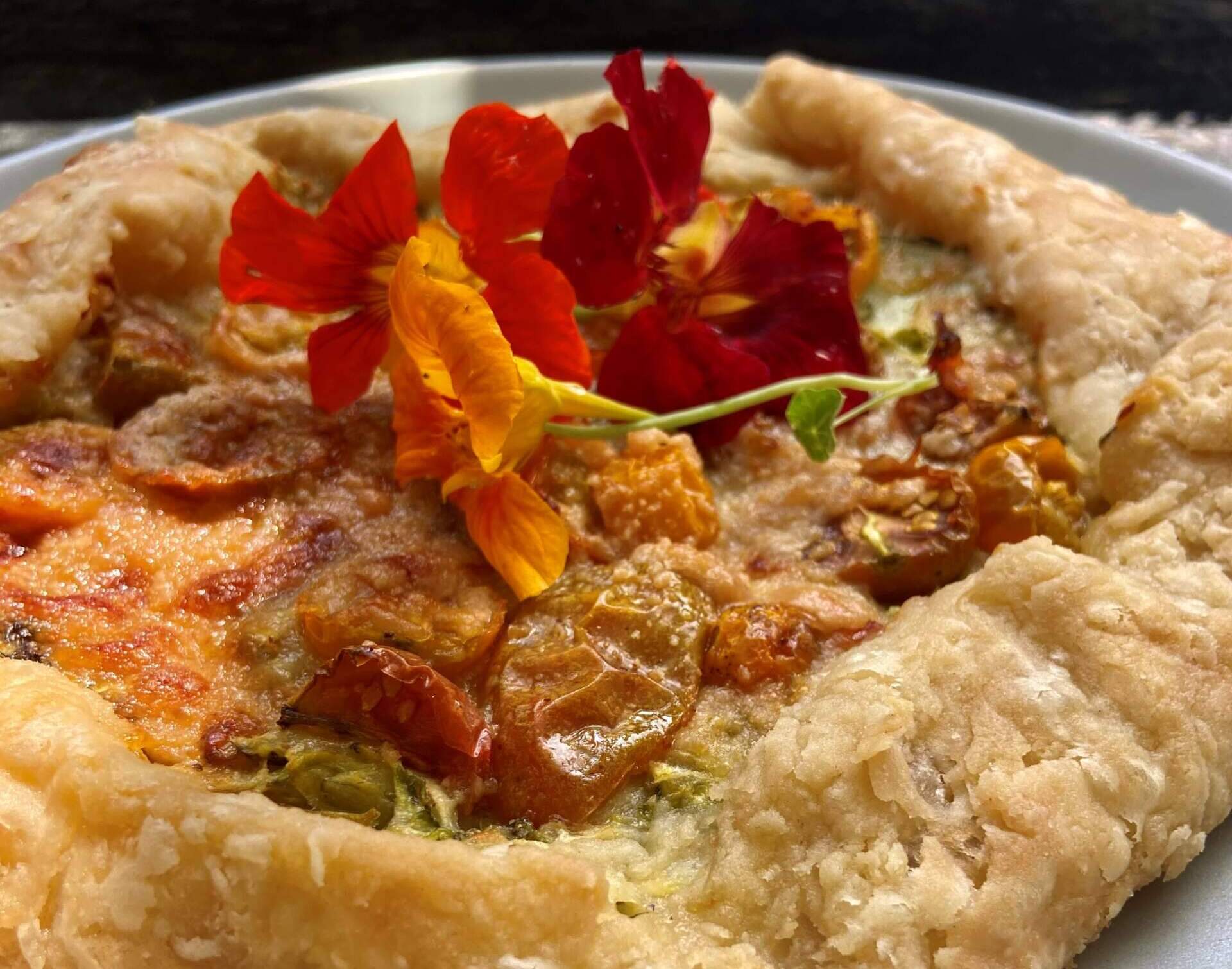 Katherine’s zucchini and tomato galette. (Kathy Gunst/Here &amp; Now)