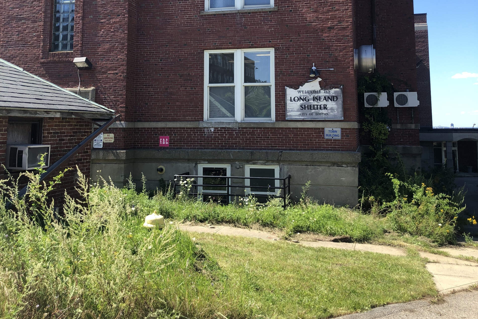 Outside one of the buildings formerly used by the city for services for people struggling with addiction and homelessness on Long Island. (Deborah Becker/WBUR)