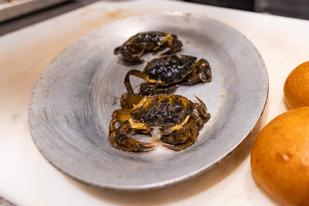 Green crabs being prepared at Row 34 in Cambridge. (Jesse Costa/WBUR)