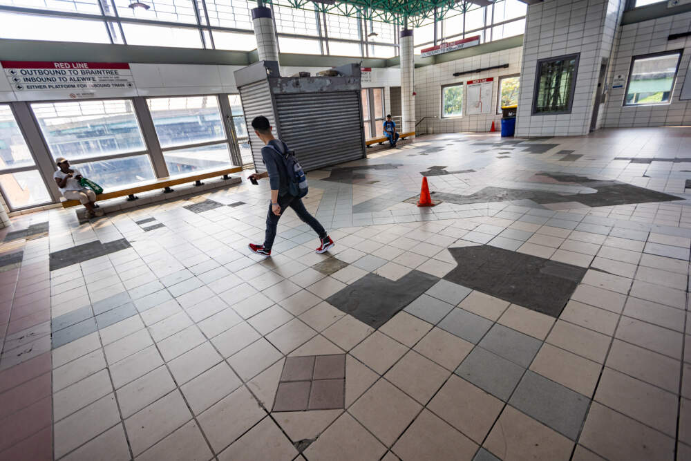 The floor tiles in the mezzanine of the JFK/UMass station need repairing and will be replaced. (Jesse Costa/WBUR)
