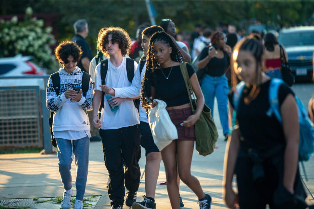 Students walk down Malcolm X Boulevard on their way to their first day of school at the John D. O’Bryant School in Roxbury. (Jesse Costa/WBUR)
