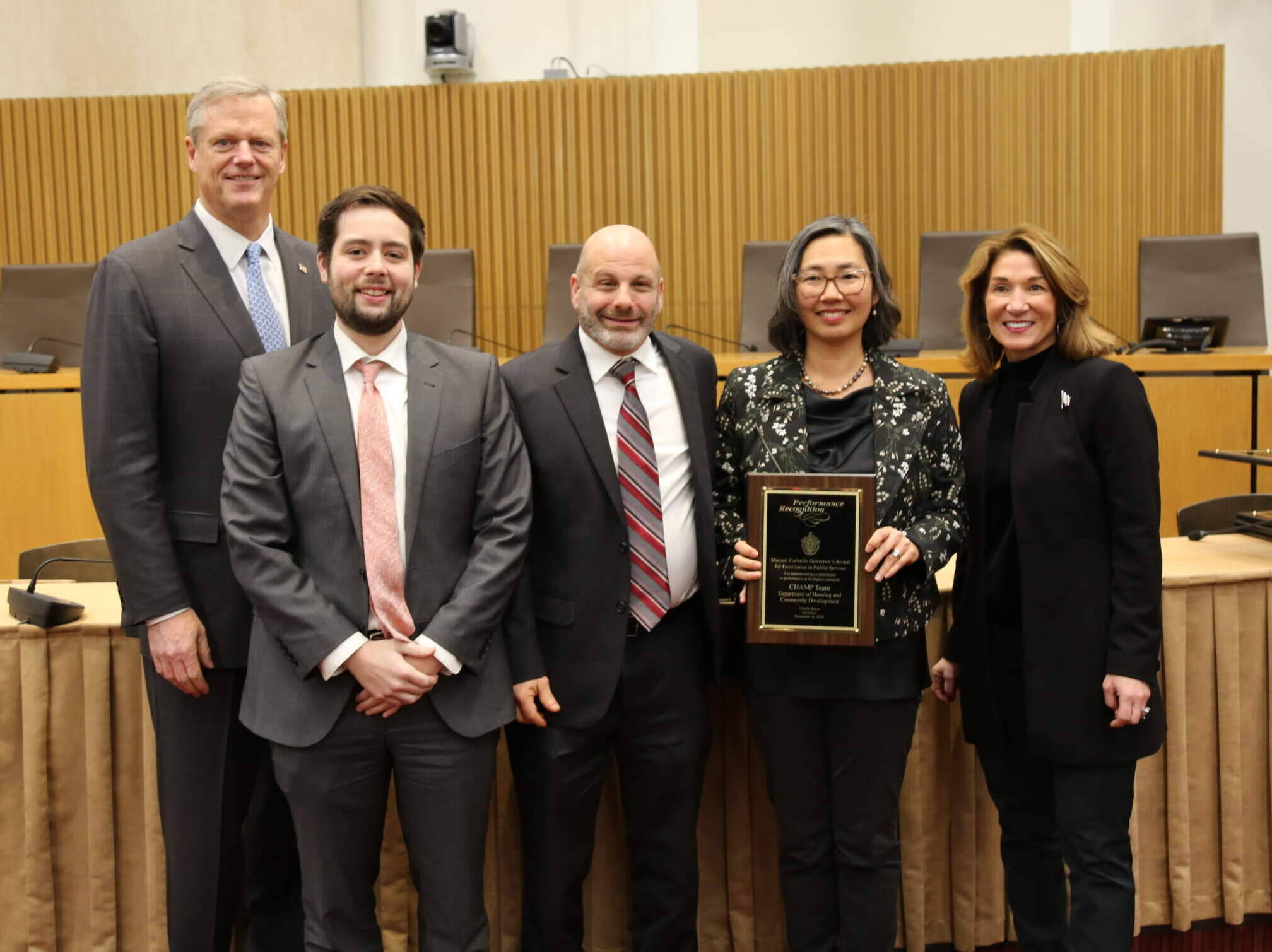 Gov. Charlie Baker and Lt. Gov. Karyn Polito honor state housing officials with the Manuel Carballo Award for Excellence in 2019. (Photo obtained by public records request)