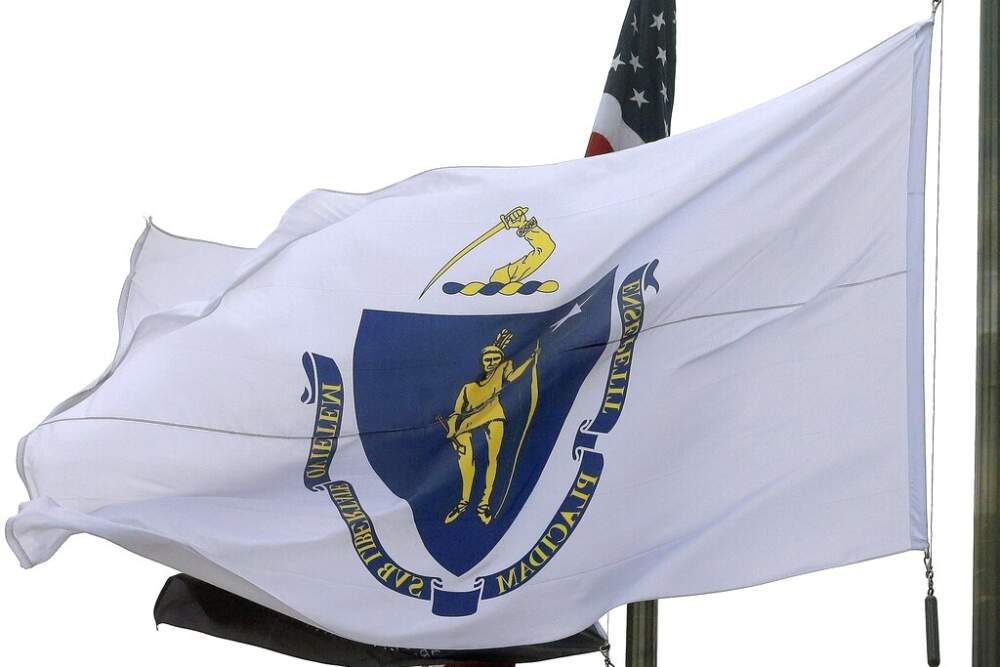 In this Monday, May 2, 2016, file photo, the Massachusetts state flag flies in front of Boston City Hall. (Steven Senne/AP)