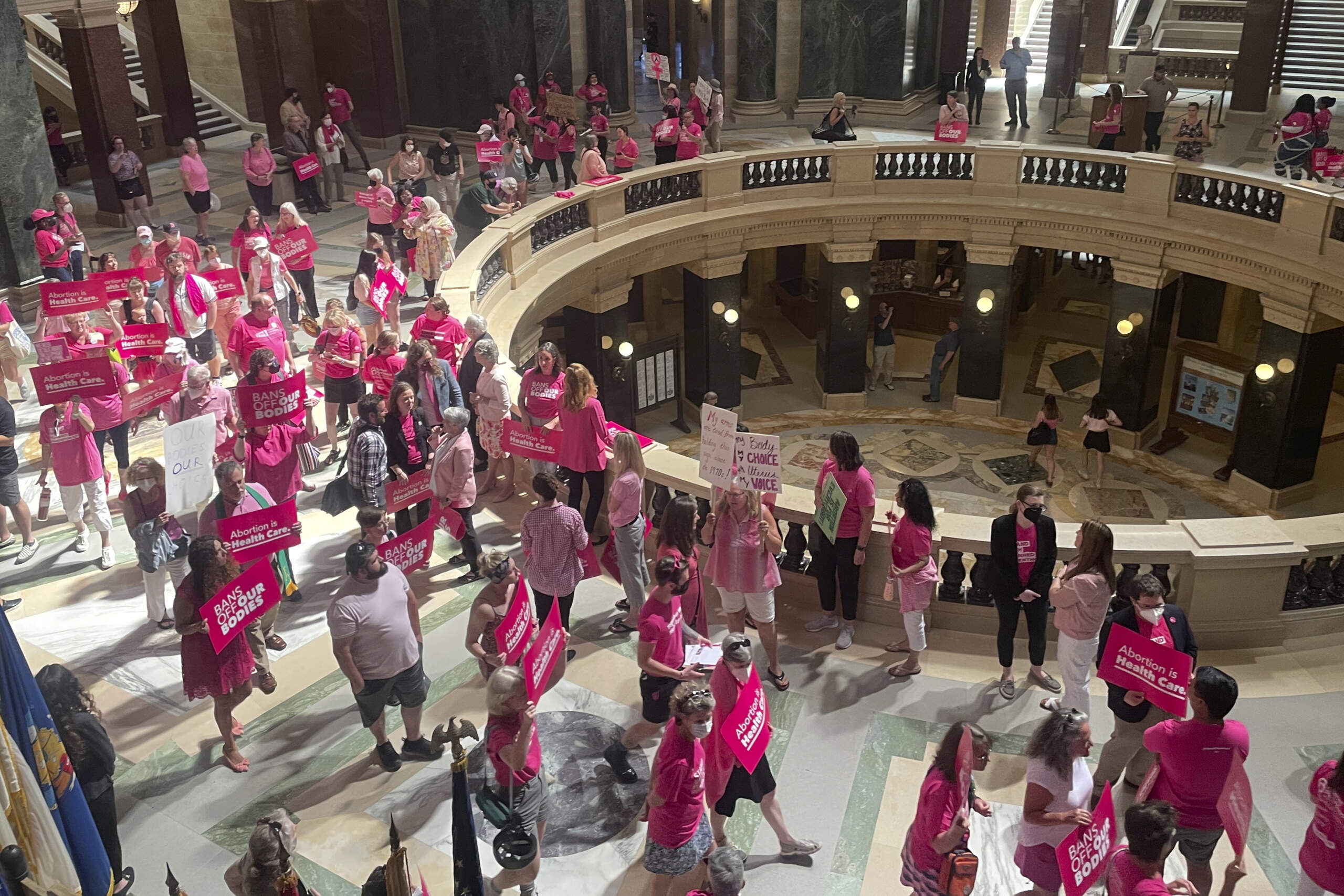 Abortion rights supporters gather for a "pink out" protest organized by Planned Parenthood in the rotunda of the Wisconsin Capitol, June 22, 2022, in Madison, Wis. Wisconsin. (Harm Venhuizen/AP)