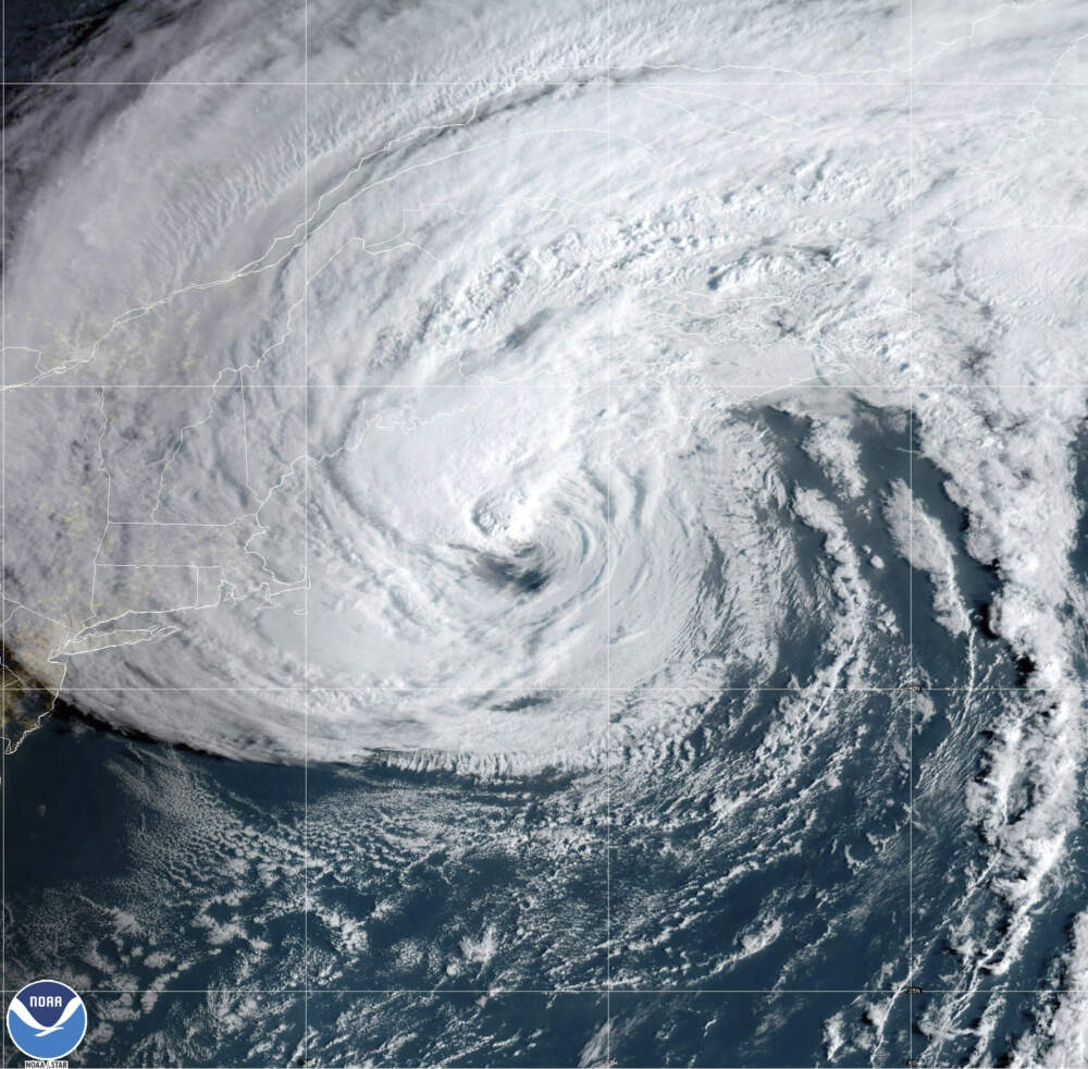 A satellite image shows Post-Tropical Cyclone Lee moving by New England Saturday morning. (NOAA via AP)