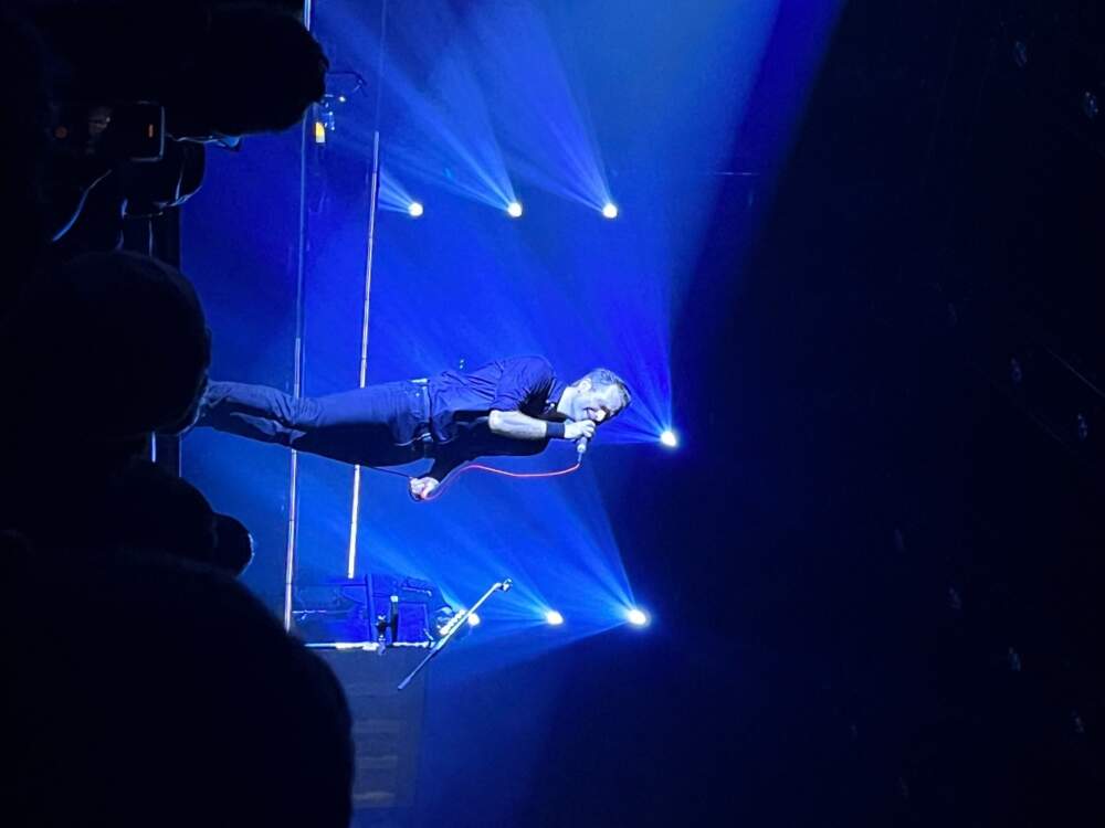 Ben Gibbard of Death Cab for Cutie, singing near the edge of the stage. Boston, 2023. (Courtesy Sara Schreur)