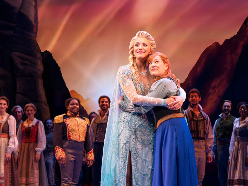Caroline Bowman as Elsa and Lauren Nicole Chapman as Anna with the company of the North American Tour of &quot;Frozen.&quot; (Courtesy Matthew Murphy)