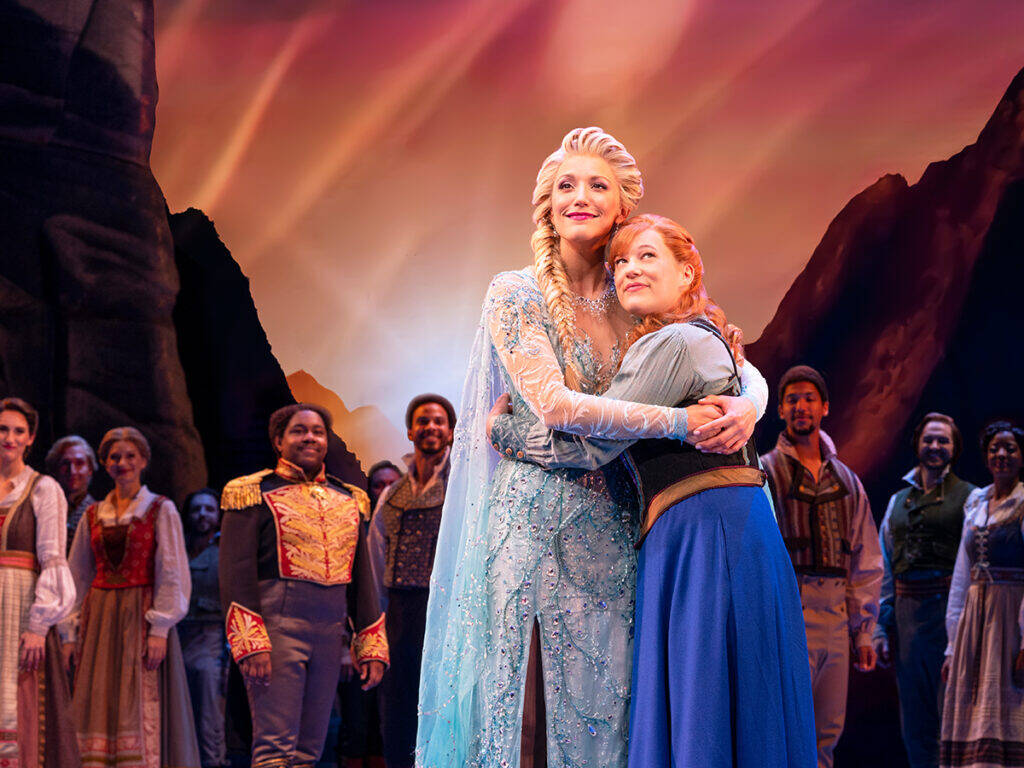 Caroline Bowman as Elsa and Lauren Nicole Chapman as Anna with the company of the North American Tour of "Frozen." (Courtesy Matthew Murphy)