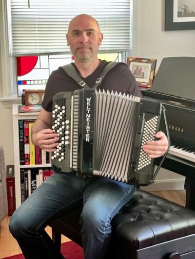 Composer Eric Shimelonis playing the accordion, one of his favorite instruments! (Photo courtesy of Rebecca Sheir)