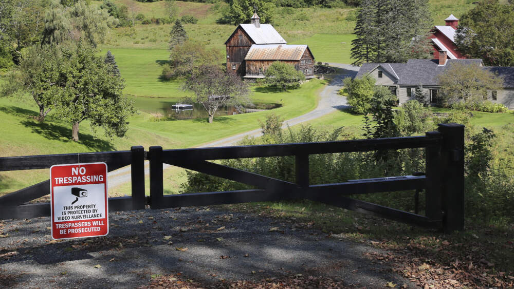 A no-trespassing sign hangs on a gate outside a private property, Thursday, Sept. 21, 2023, in Pomfret, Vermont, that has become a destination for fall foliage viewers, clogging a narrow rural road. (Lisa Rathke/AP)