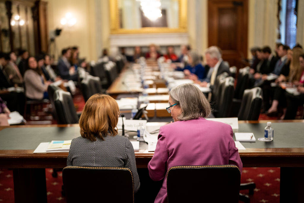 WASHINGTON, DC - FEBRUARY 16: Stacy Dean, Deputy Under Secretary of Food Nutrition and Consumer Services, right, turns to fellow witness, Cindy Long, Administrator, U.S. Department of Agriculture, left, during of a hearing of the Senate Agriculture, Nutrition and Forestry hearing to examine the 2023 Farm Bill on Capitol Hill on Thursday, Feb. 16, 2023 in Washington, DC. (Kent Nishimura / Los Angeles Times via Getty Images)