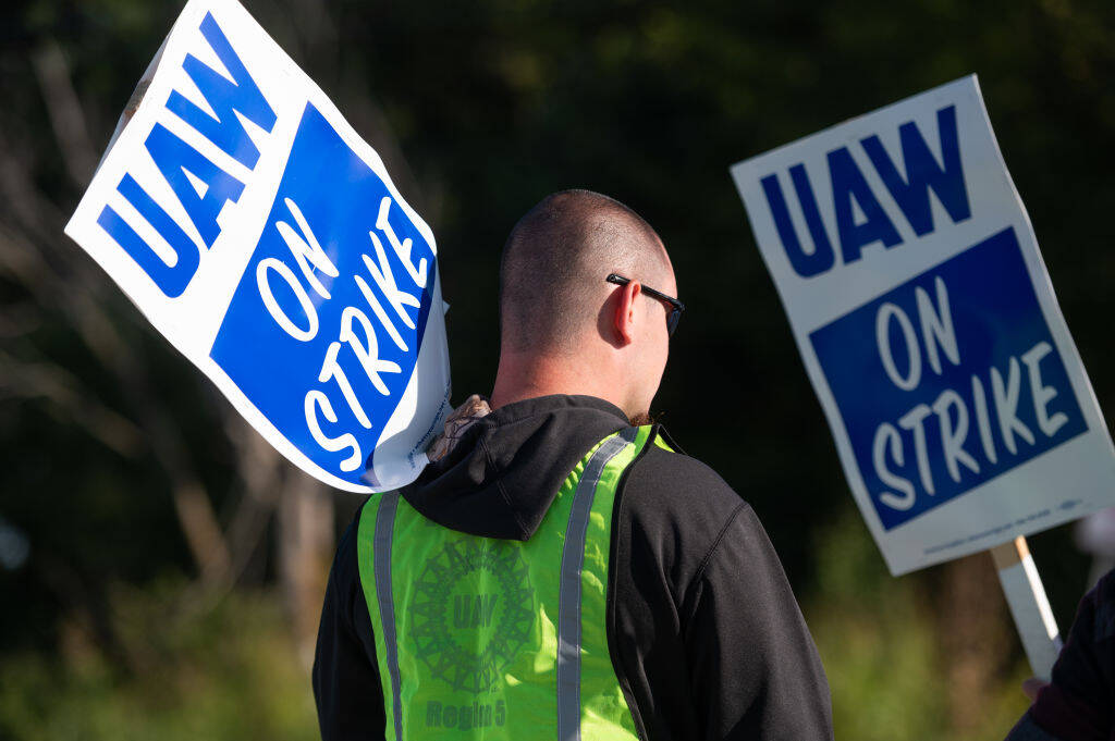 GM workers with the UAW Local 2250 Union strike outside the General Motors Wentzville Assembly Plant on September 15, 2023 in Wentzville, Missouri. In the first time in its history the United Auto Workers union is on strike against all three of America’s unionized automakers, General Motors, Ford and Stellantis, at the same time. (Photo by Michael B. Thomas/Getty Images)