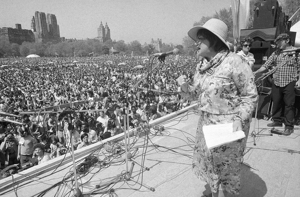 Bella Abzug speaks to a crowd of about 10,000 gathered in the Sheep Meadow of Central Park, at "The War is Over" celebration in 1975. (Getty Images)