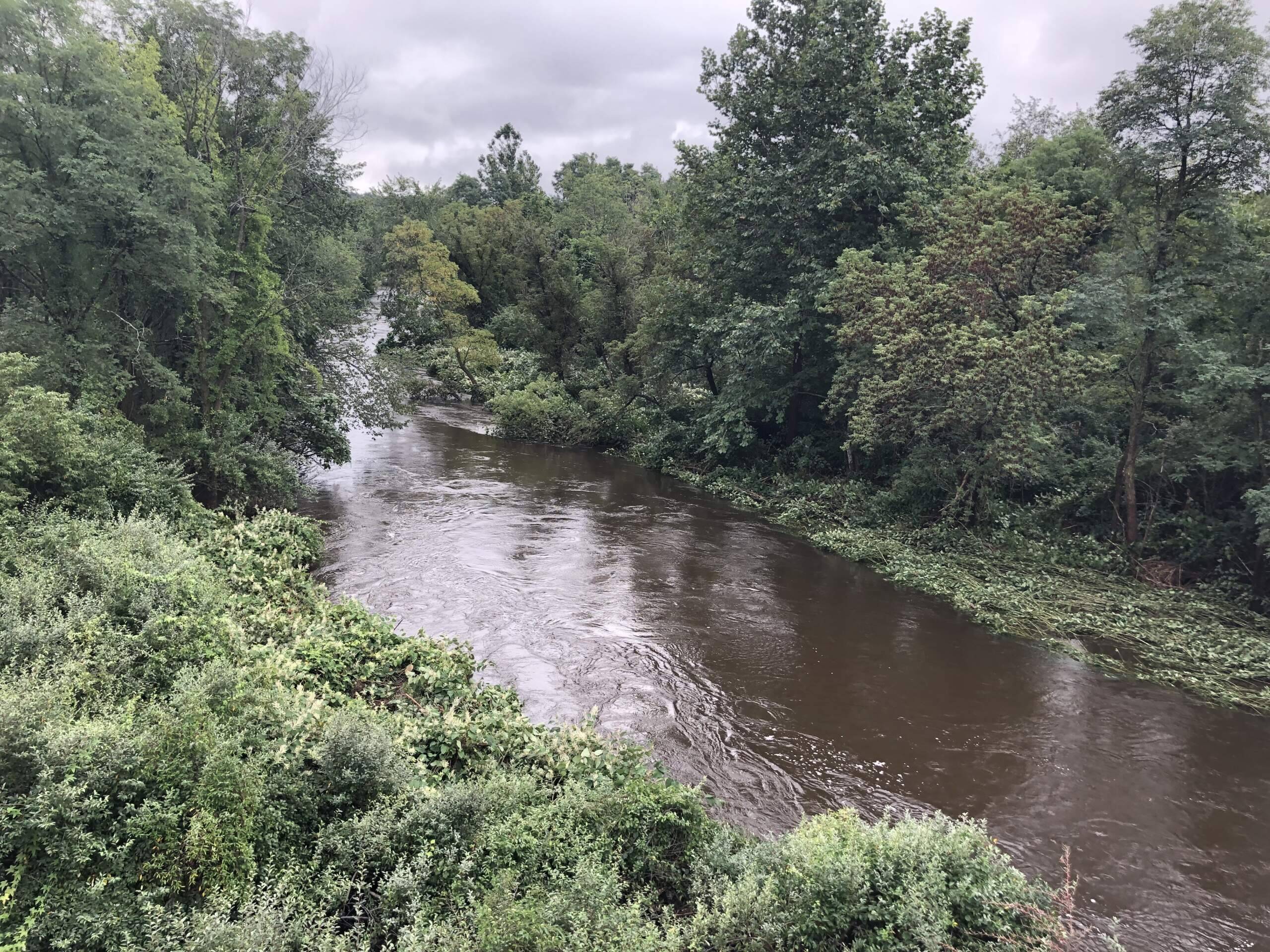 North Nashua River in Leominster. The bridge across the river has been closed to traffic following severe flooding, Tuesday, Sept. 12, 2023. (Carrie Jung/WBUR)