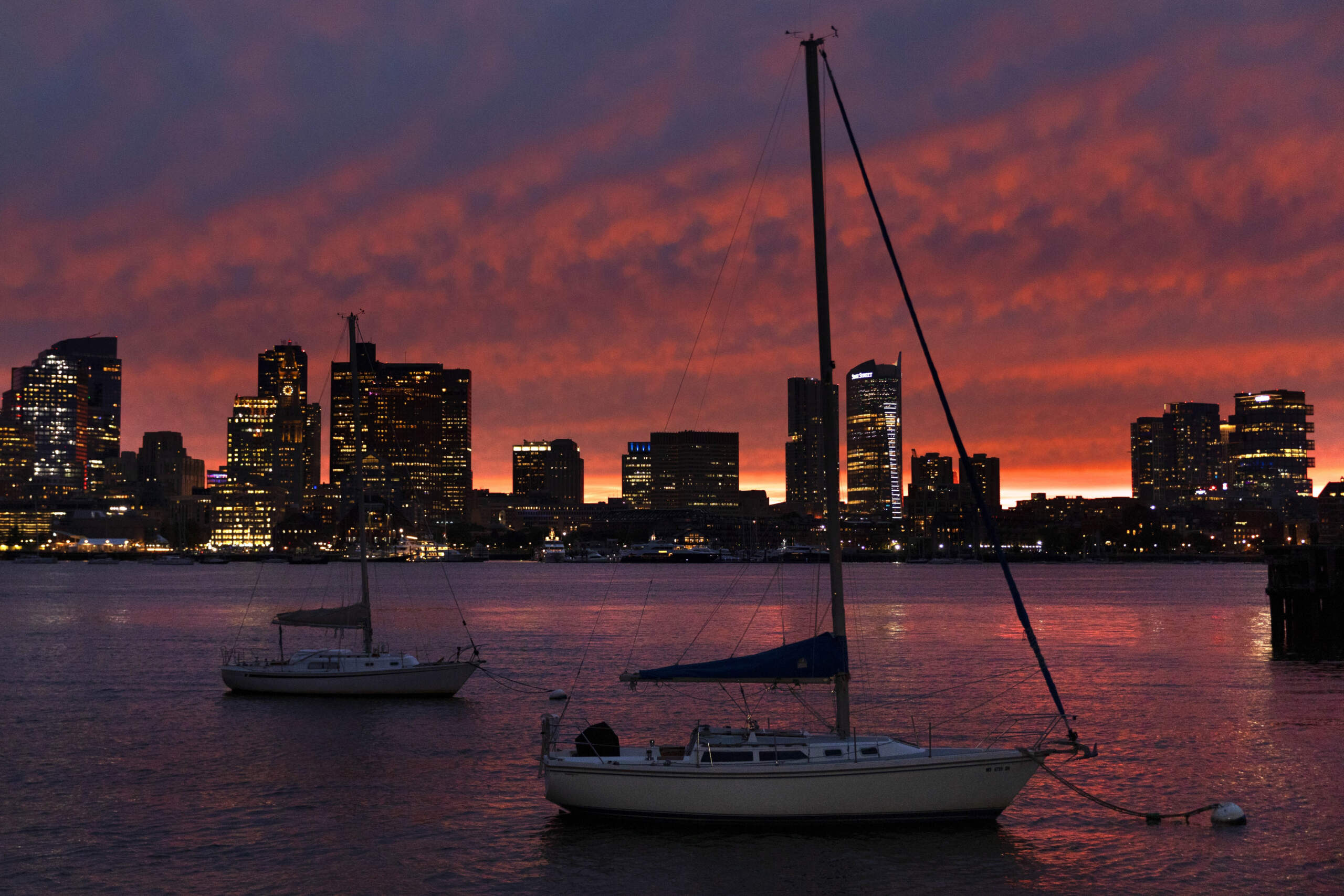 The sunset before the storm on Friday night. (AP Photo/Michael Dwyer)