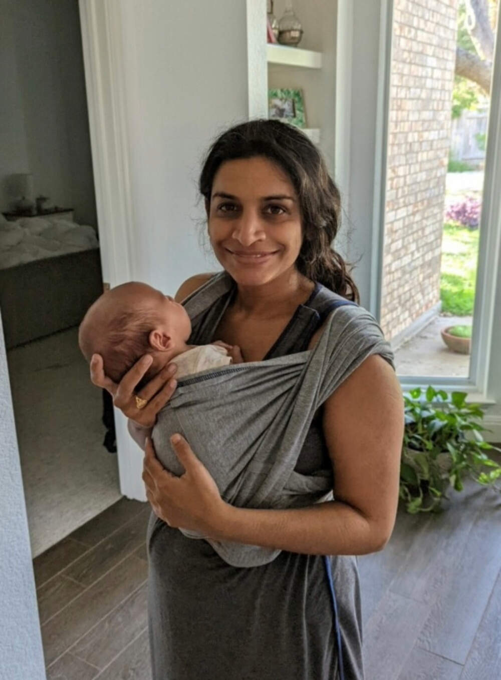 Pooja Lakshmin and her son postpartum. (Courtesy)