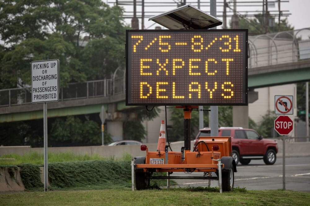A sign near the Sumner Tunnel entrance warn drivers to expect delays ahead of the closure. (Robin Lubbock/WBUR)