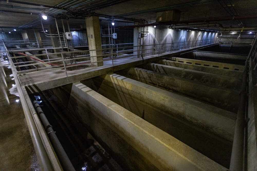 The Prison Point Conbined Sewer Overflow Facility has six detention basins that can each hold about 200,000 gallons of water. After the waste water is filtered and chlorinated, it must sit in these basins for at least 20 minutes to give the chlorine time to kill off any bacteria. (Jesse Costa/WBUR)