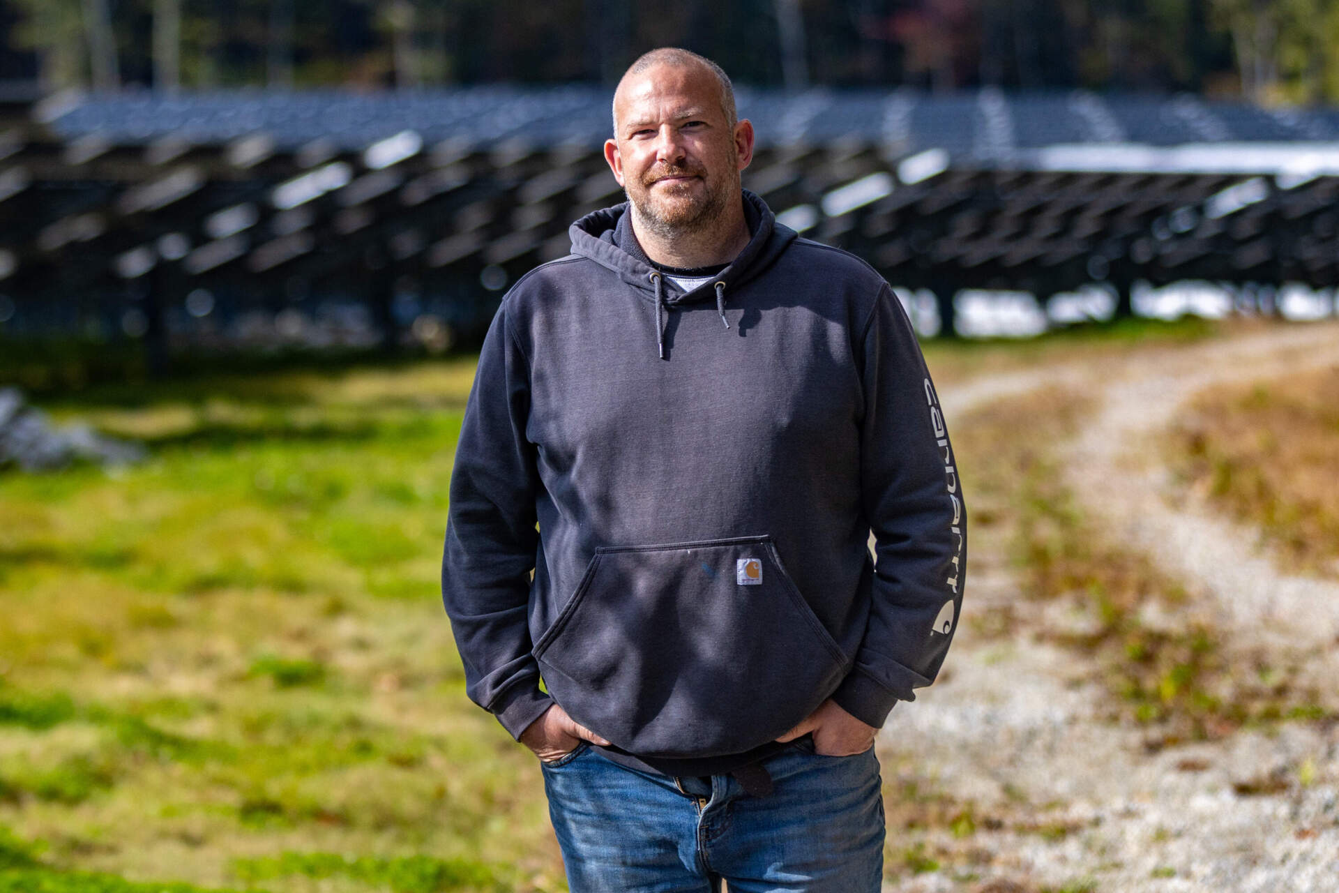Lawrence Cook of PureSky Energy at Wallum Lake Solar Farm in Douglas. (Jesse Costa/WBUR)