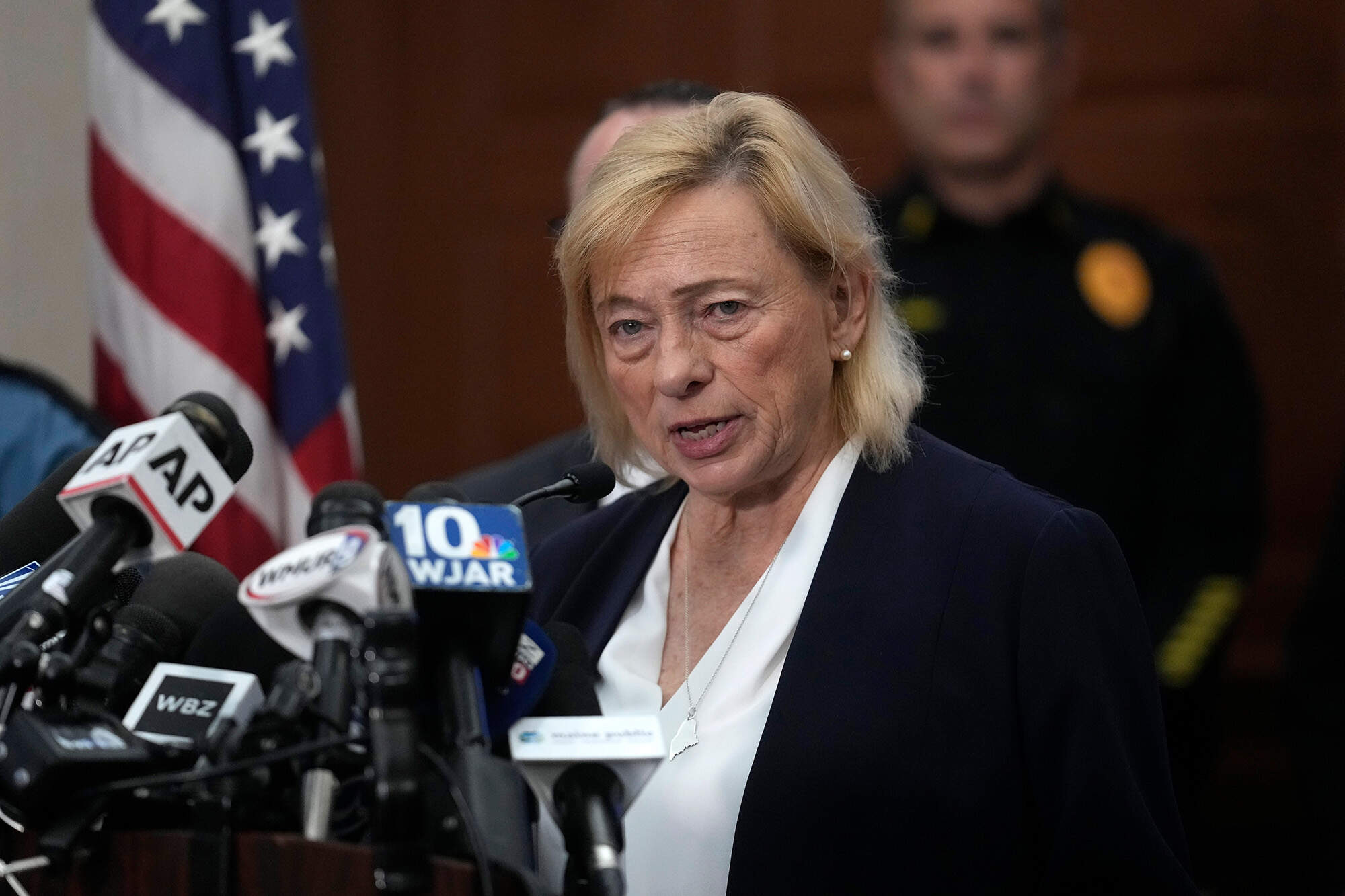 Maine Gov. Janet Mills speaks to reporters on Thursday at Lewiston City Hall. Residents have been ordered to shelter in place as police continue to search for the suspect of Wednesday's mass shootings. (Steven Senne/AP)