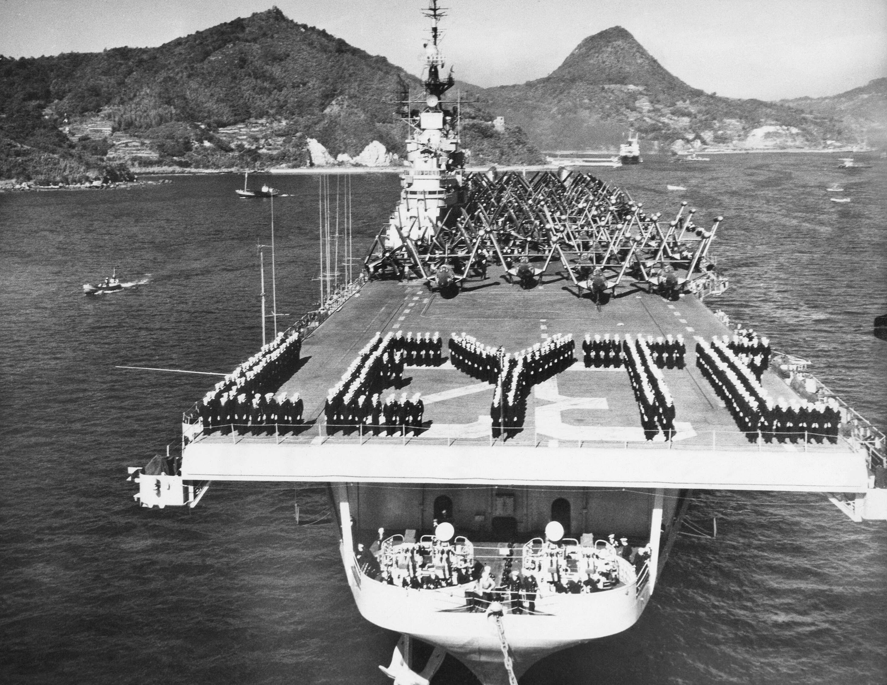 The crew of the USS Leyte forms &quot;Leyte&quot; on the flight deck while the ship is anchored on Dec. 1, 1950. (AP)
