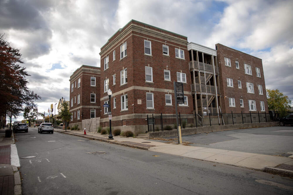 Apartments owned by Terra Incognita are under refurbishment on Elm Street in New Bedford. (Robin Lubbock/WBUR)