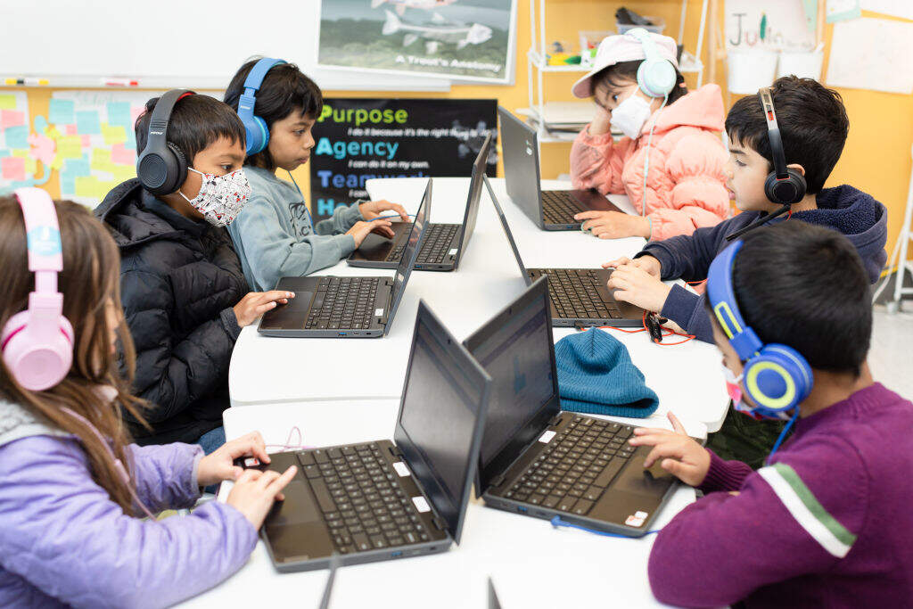 Students Josephine Chan, Sahir S., Arohi Brahmachari, Iris Wang, Arjan Tyagi, and Anay Sharma work on a classroom exercise using Khanmigo, an AI-powered guide developed by Khan Academy, during a math and sciences class at Khan Lab School on Friday, March 31, 2023, in Palo Alto, Calif.
(Photo by Constanza Hevia H. for The Washington Post via Getty Images)