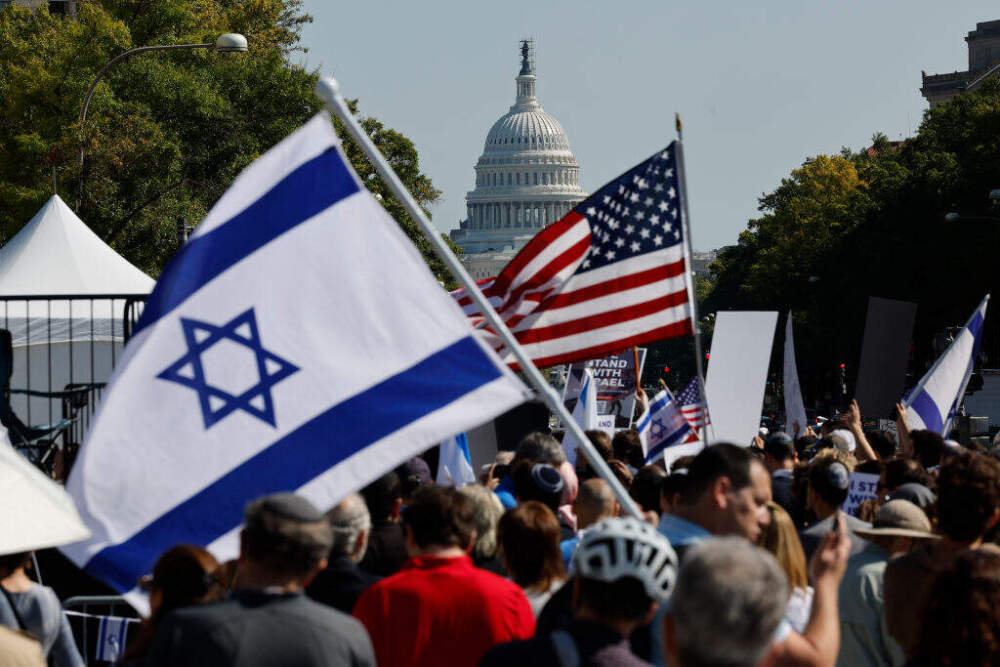 WASHINGTON, DC - OCTOBER 13: People gather for a 'Stand With Israel Rally' in Freedom Plaza on October 13, 2023 in Washington, DC. Organized by the Jewish Community Relations Council (JCRC) of Greater Washington, people gathered to show their support for Israel following the October 8 surprise assault by Hamas that killed at least 1,300 people and resulted in the kidnapping of 150 hostages that were taken to Gaza. (Photo by Chip Somodevilla/Getty Images)