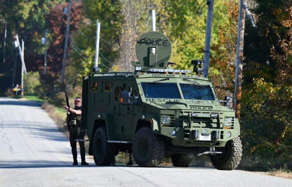 Armed law enforcement personnel stand on the side of a road in Monmouth, Maine, on October 27, 2023, in the aftermath of a mass shooting in Lewiston, Maine. (Angela Weiss/ AFP via Getty Images)