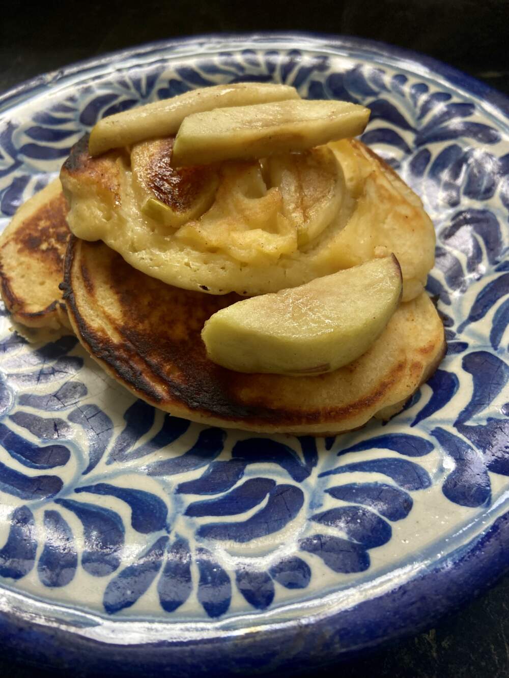 Buttermilk-almond pancakes with maple-glazed apple slices. (Kathy Gunst/Here & Now)