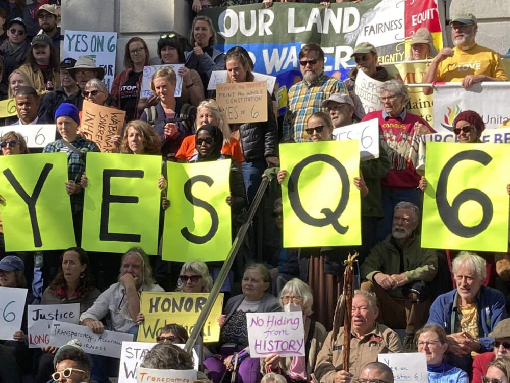 Several hundred people rally outside the State House in support of a statewide vote on an amendment to restore tribal treaties to printed versions of the Maine Constitution, on Monday, Oct. 9, 2023, in Augusta, Maine. (David Sharp/AP)