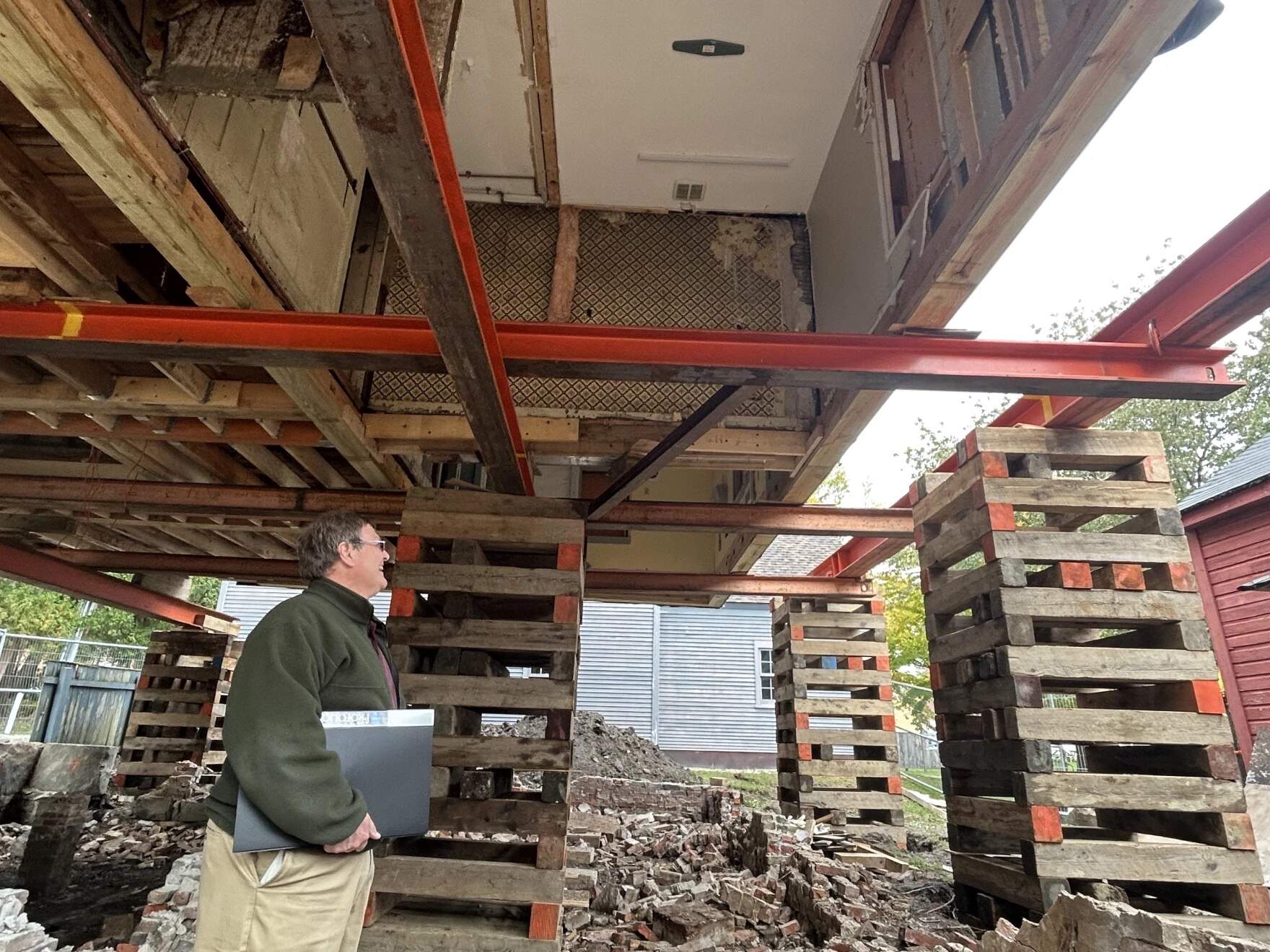 Most recently, the Penhallow House was used as public restrooms for the museum. But all of the 20th century material was taken out, so the original wallpaper covered the walls. (Mara Hoplamazian/NHPR)
