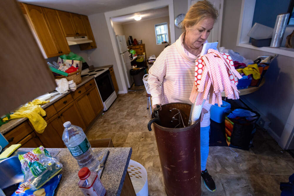 Deb Libby moves her belongings out as she is evicted from her apartment in Worcester. (Jesse Costa/WBUR)