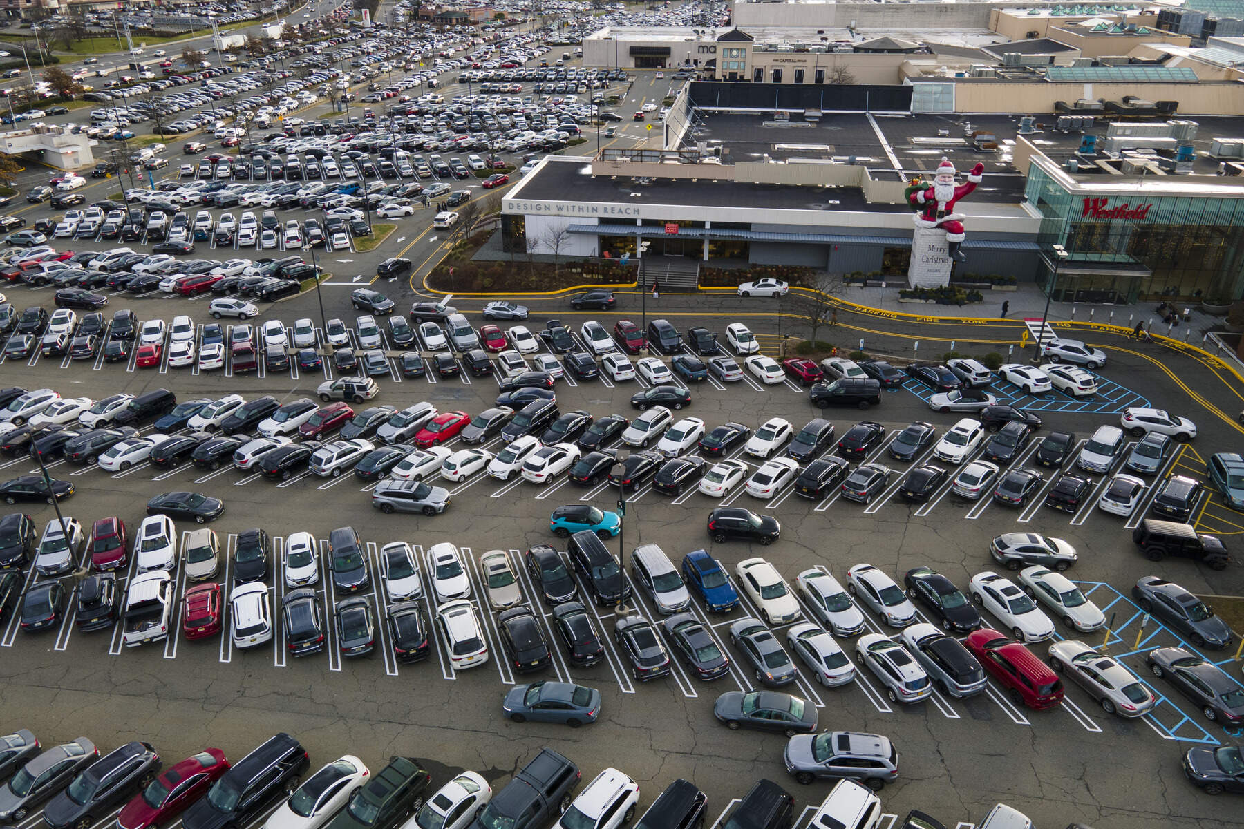 Vehicles are stored in the lots. (Keith Srakocic/AP)