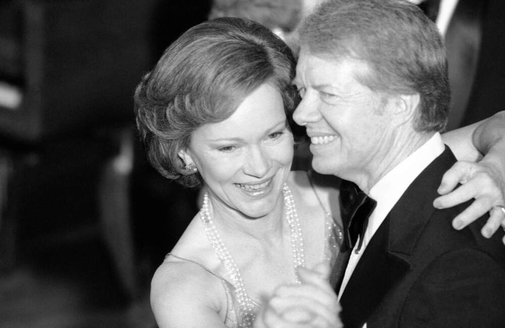 President Jimmy Carter, right, and his wife, first lady Rosalynn Carter, lead their guests in dancing at the annual Congressional Christmas Ball, Dec. 13, 1978, at the White House in Washington. (Ira Schwarz/AP)