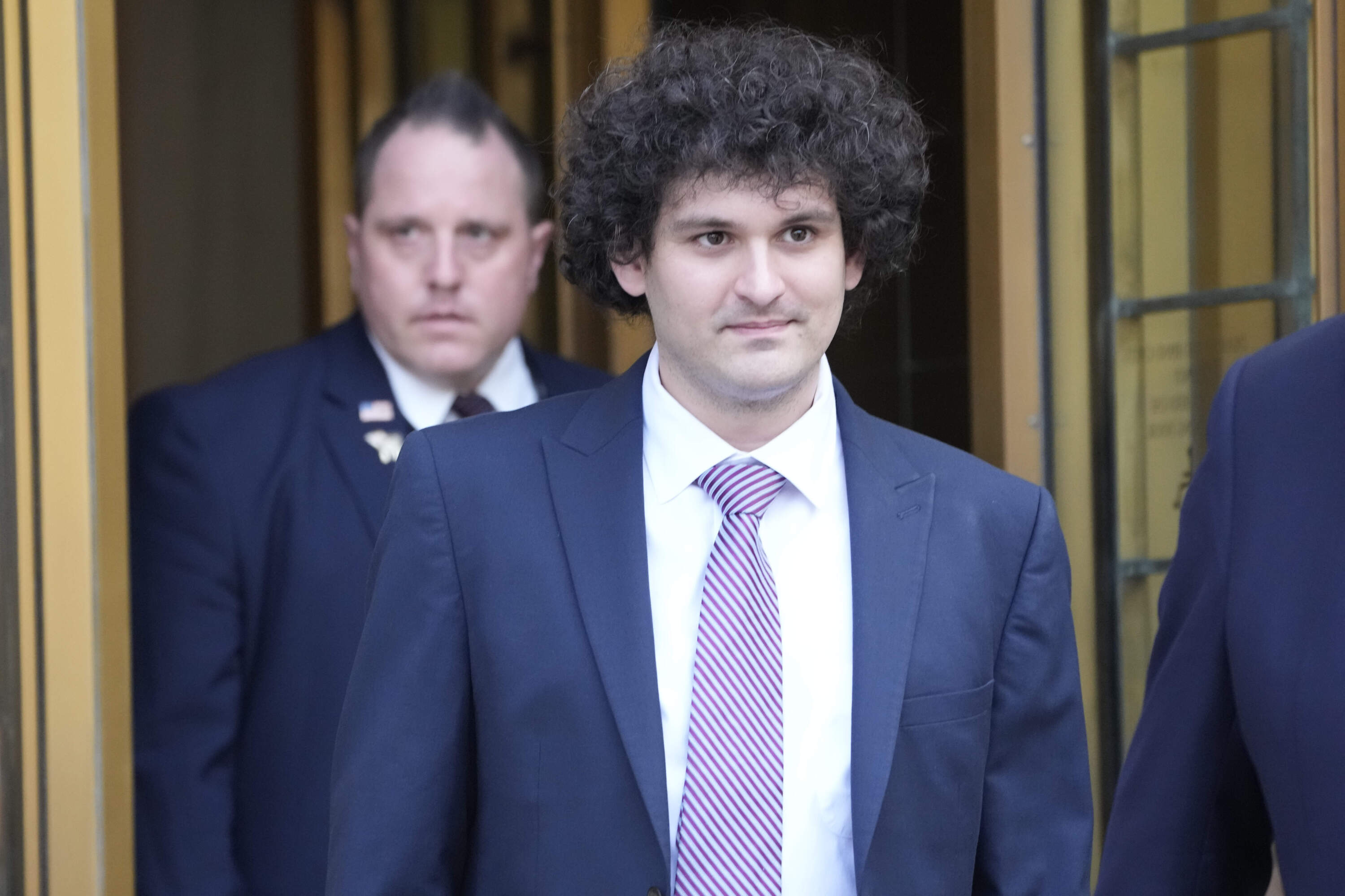 FTX founder Sam Bankman-Fried leaves Federal court, Wednesday, July 26, 2023, in New York. (Mary Altaffer/AP)