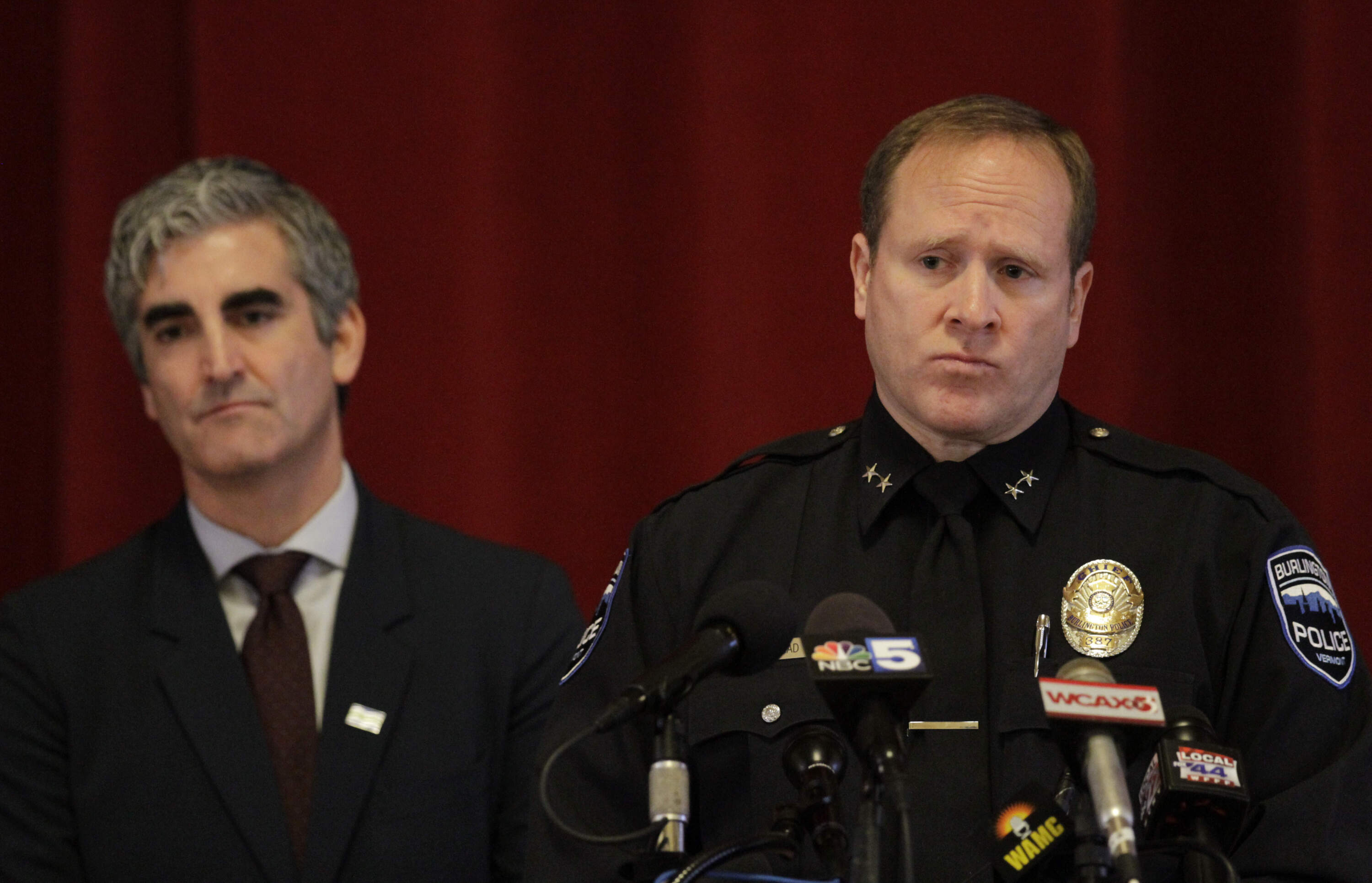 Burlington Police Chief Jon Murad listens to questions at a news conference with Mayor Miro Weinberger. (Hasan Jamali/AP)